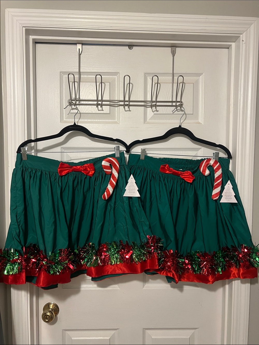 Set of Green Tinsel Trim Skirts with Red Bow